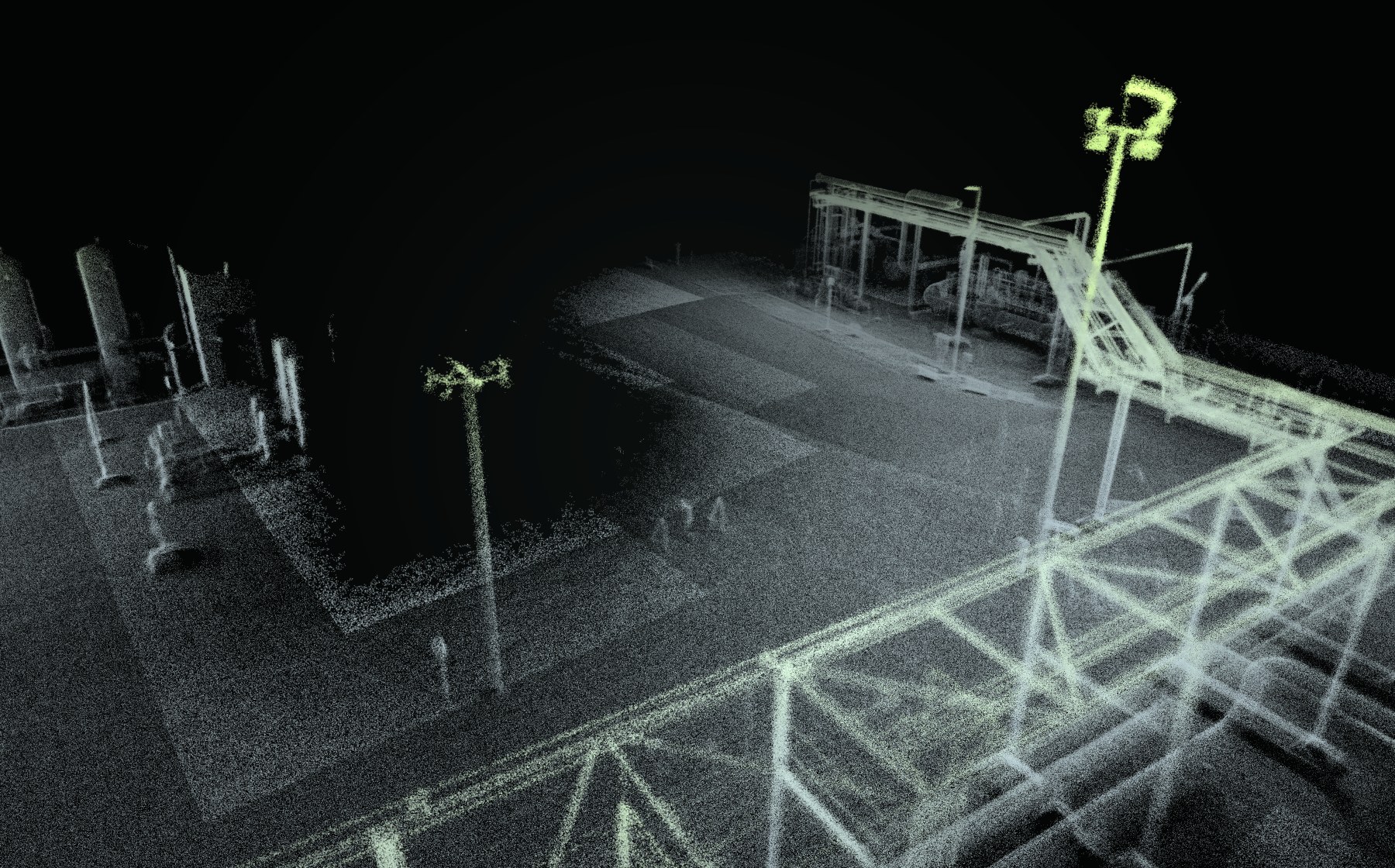 Rohrbrücke als Punktwolke aus der Nähe: Fachwerk im Vordergrund, dahinter der Abzweig der Brücke und Lichtmasten
